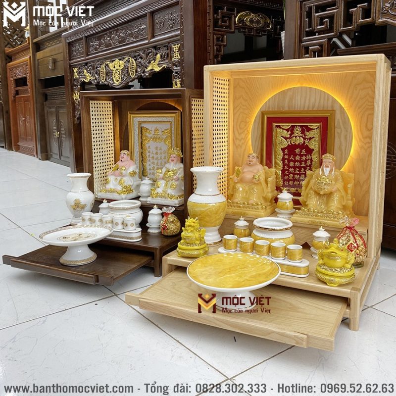 Bàn thờ ông địa thần tài được thiết kế thêm ngăn kéo tiện lợi, giúp tăng không gian sử dụng